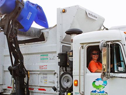 Rhonda Dumping Recycling Can